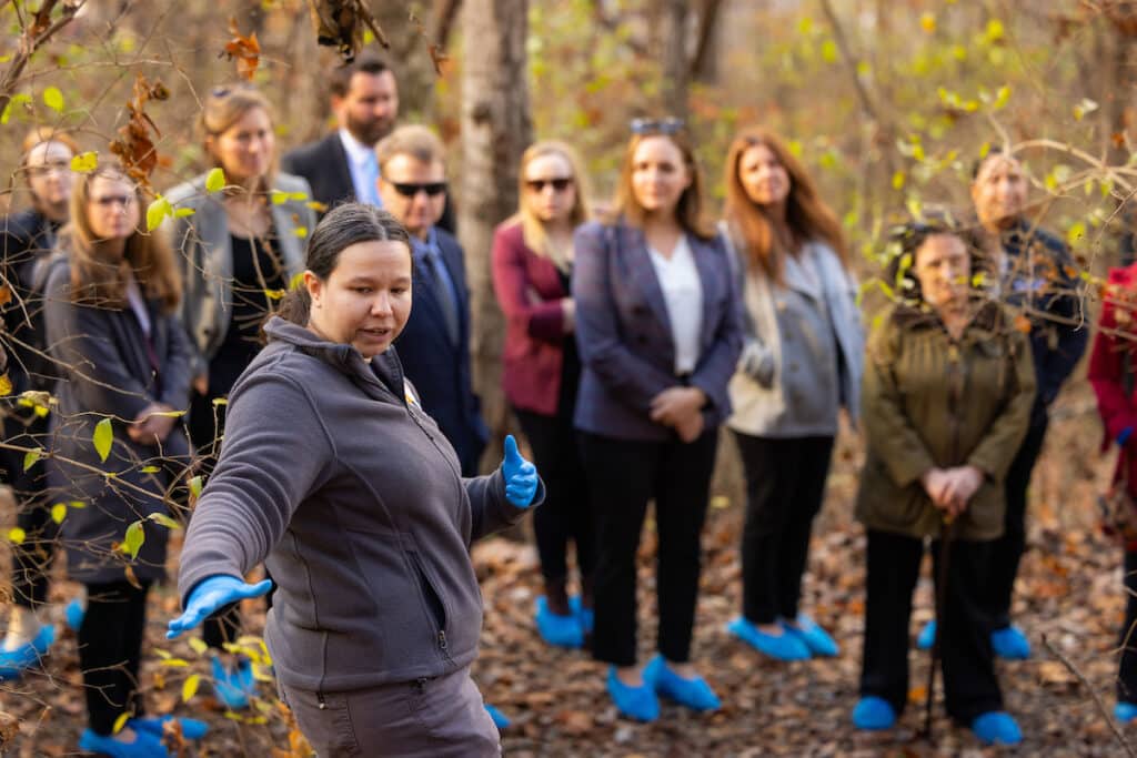 Mary Davis, Research Associate II, Forensic Anthropology Center, talks about different processes while giving a tour of the Forensic Anthropology Center during a National Institute of Justice site visit to the University of Tennessee on December 04, 2023. Photo by Steven Bridges/University of Tennessee